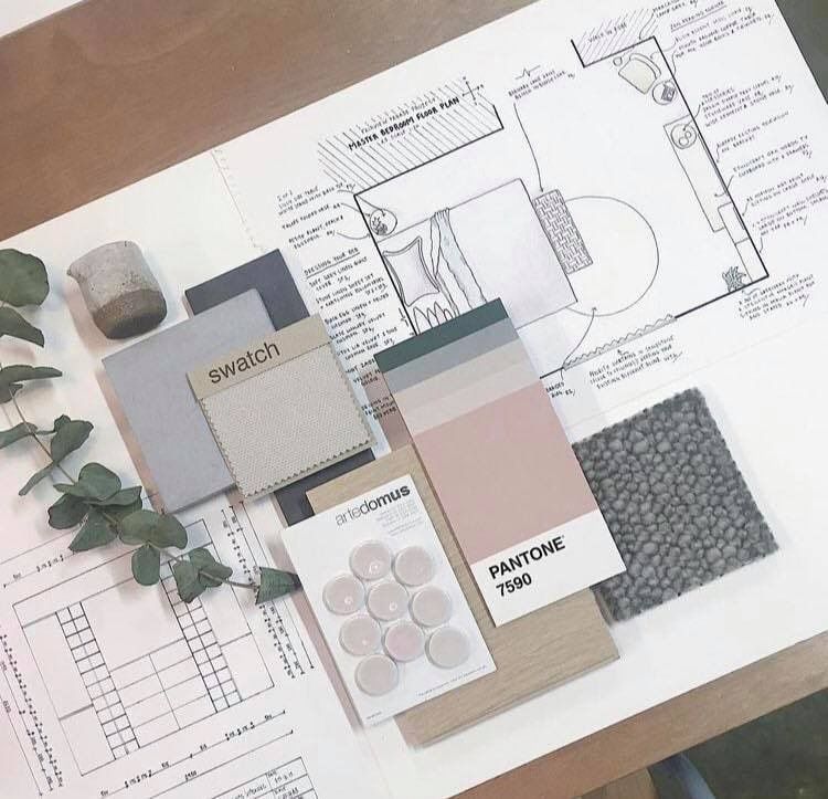 Studio moodboard and material samples on table